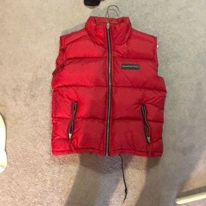 A small Red weather tech vest that’s waterproof